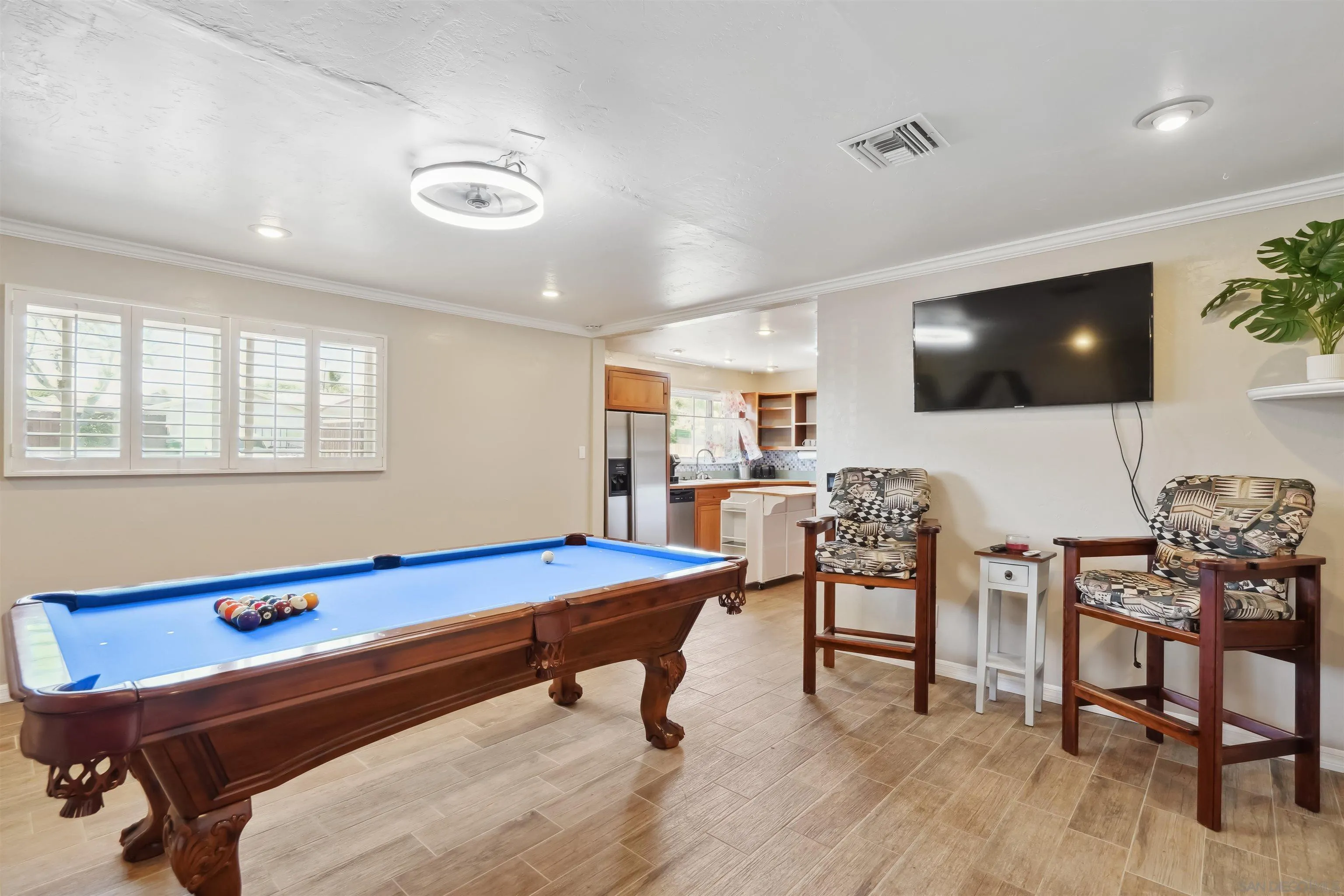 9537 East Hartland Circle Santee, CA 92071 - Photo 10 of 42 a living room with furniture and a flat screen tv