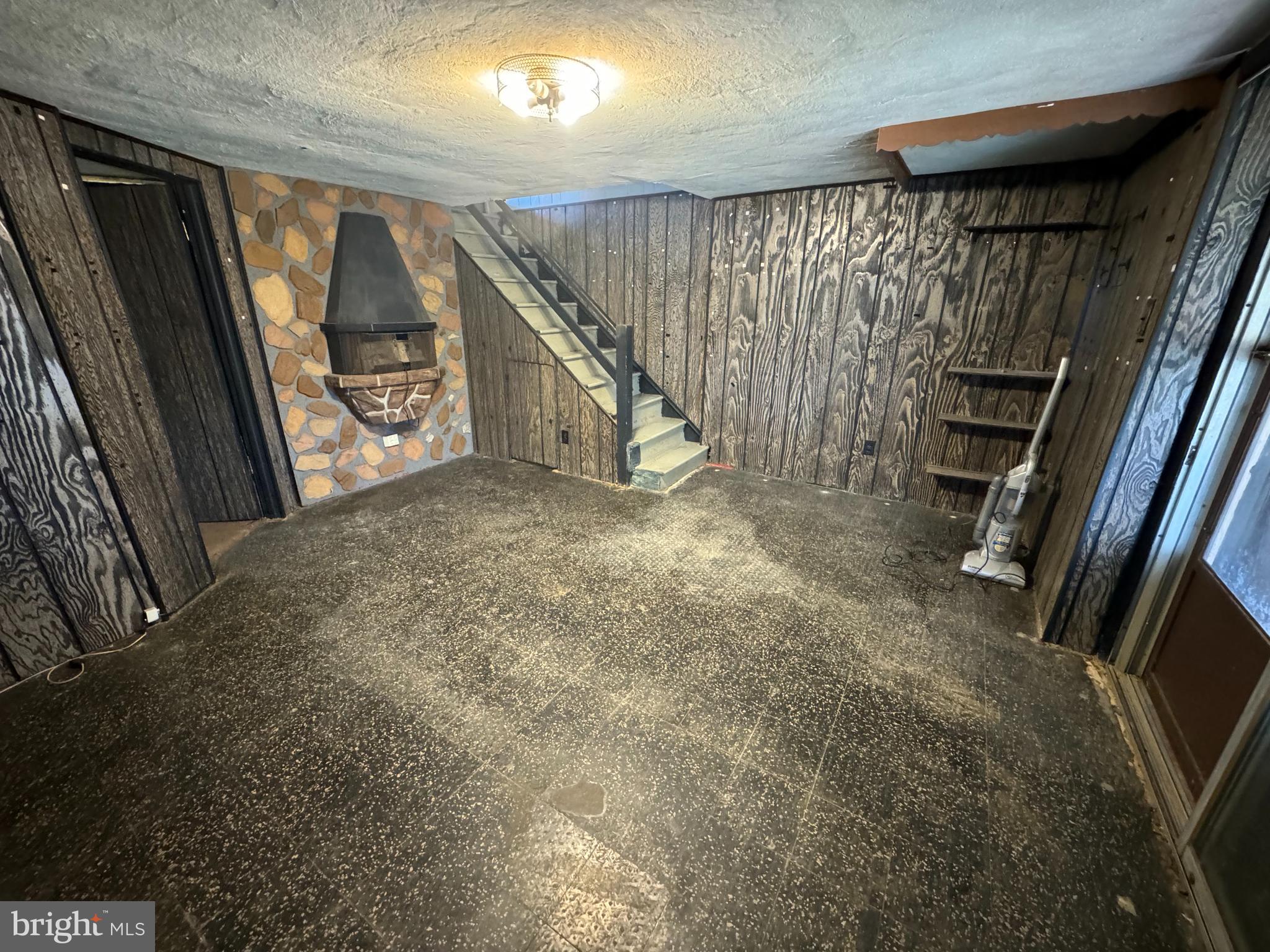 9955 Bridle Road Philadelphia, PA 19115 - Photo 2 of 14 a view of an empty room with stairs