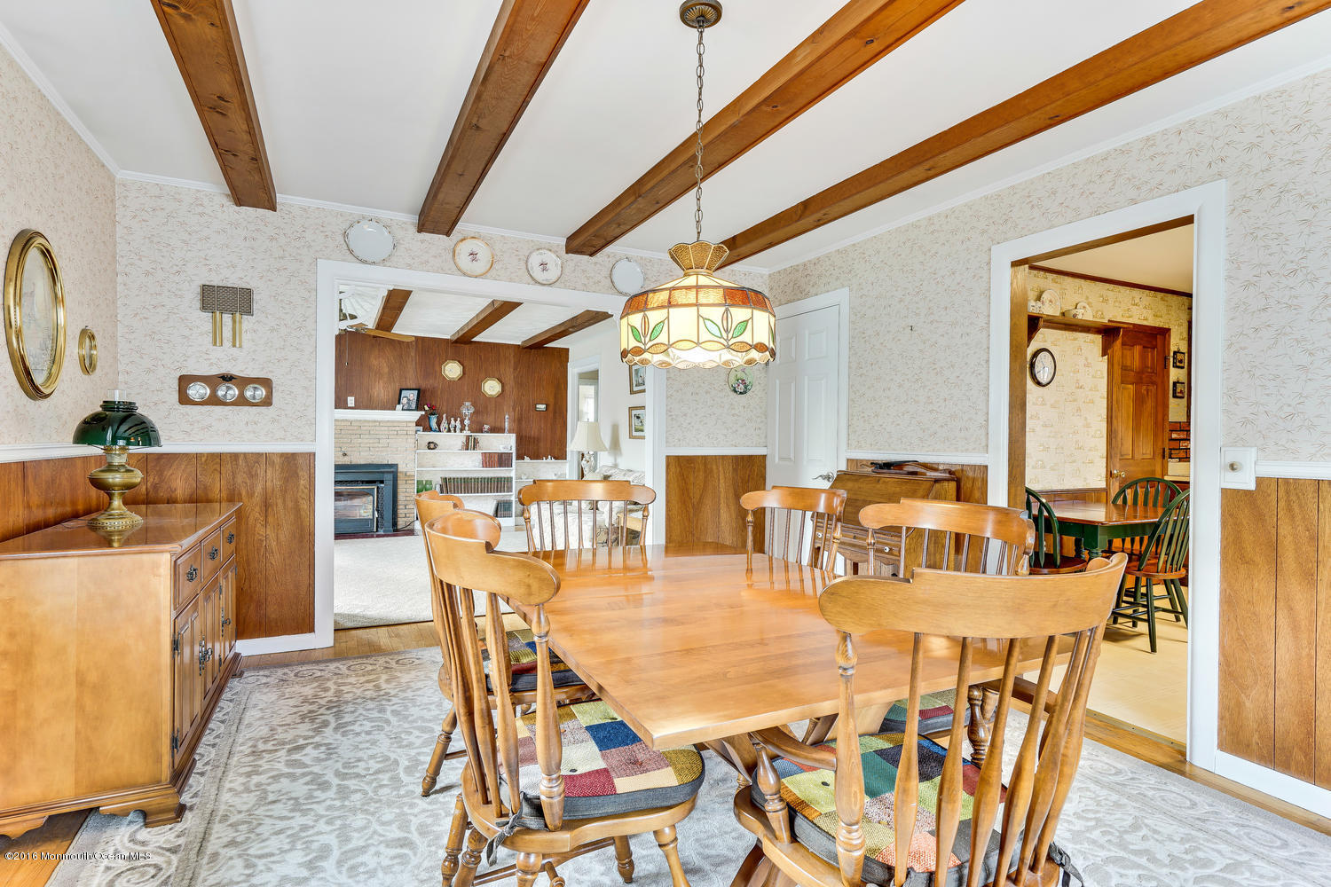 63 Cannon Road Freehold, NJ 07728 - Photo 13 of 34 a view of a dining room with furniture and a chandelier