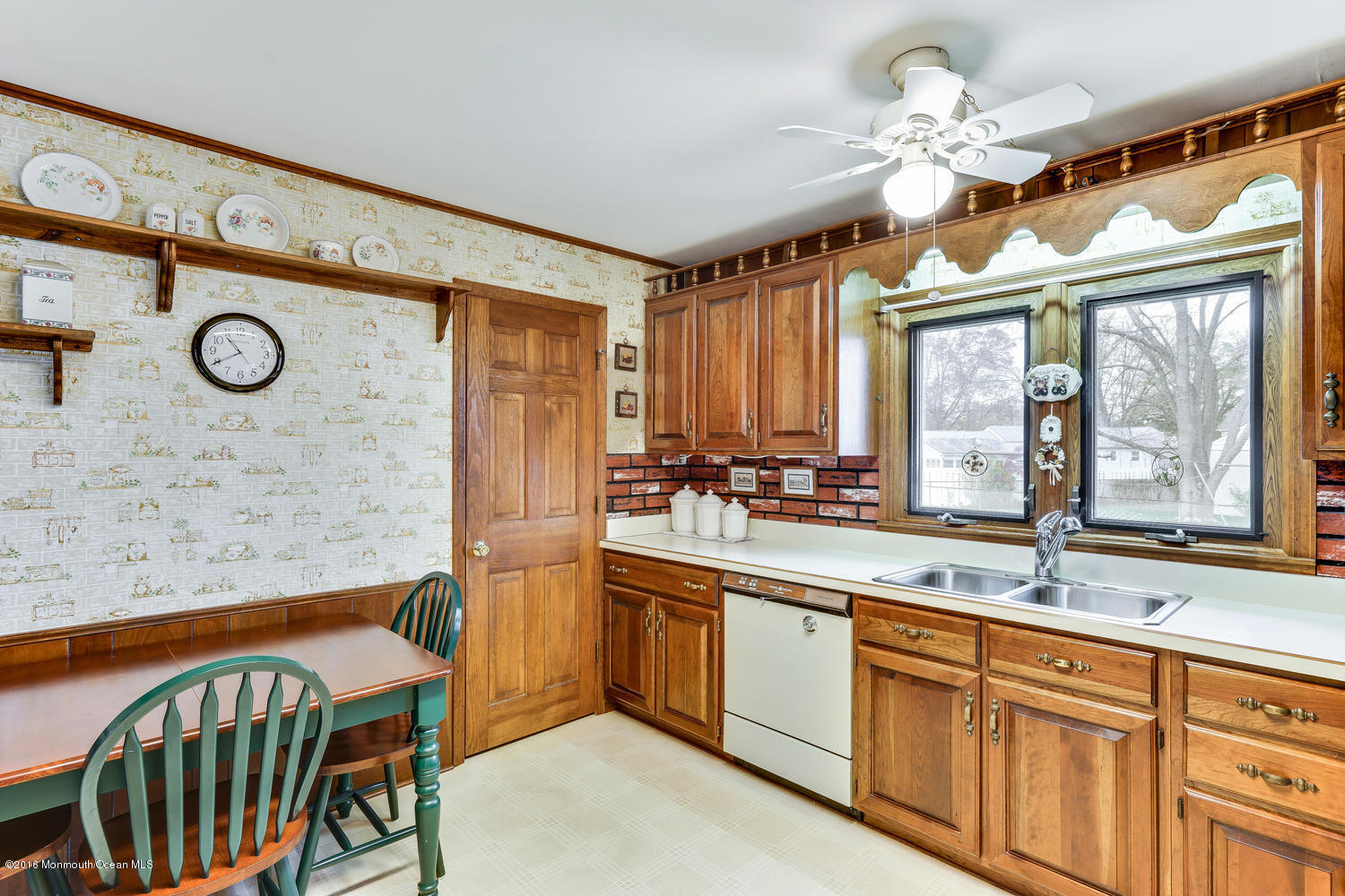 63 Cannon Road Freehold, NJ 07728 - Photo 20 of 34 a bathroom with a sink a mirror and a window