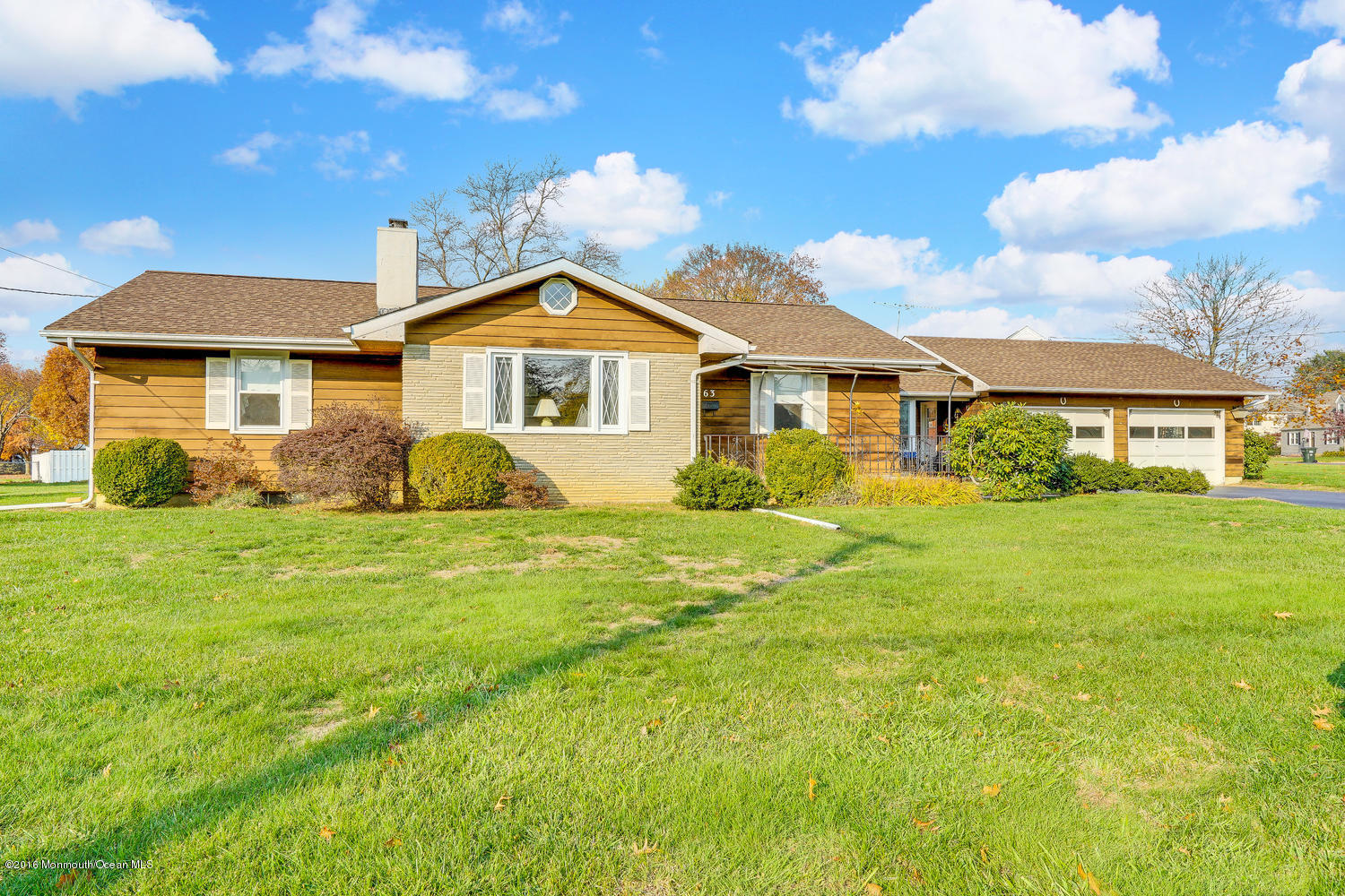 63 Cannon Road Freehold, NJ 07728 - Photo 2 of 34 a front view of a house with garden