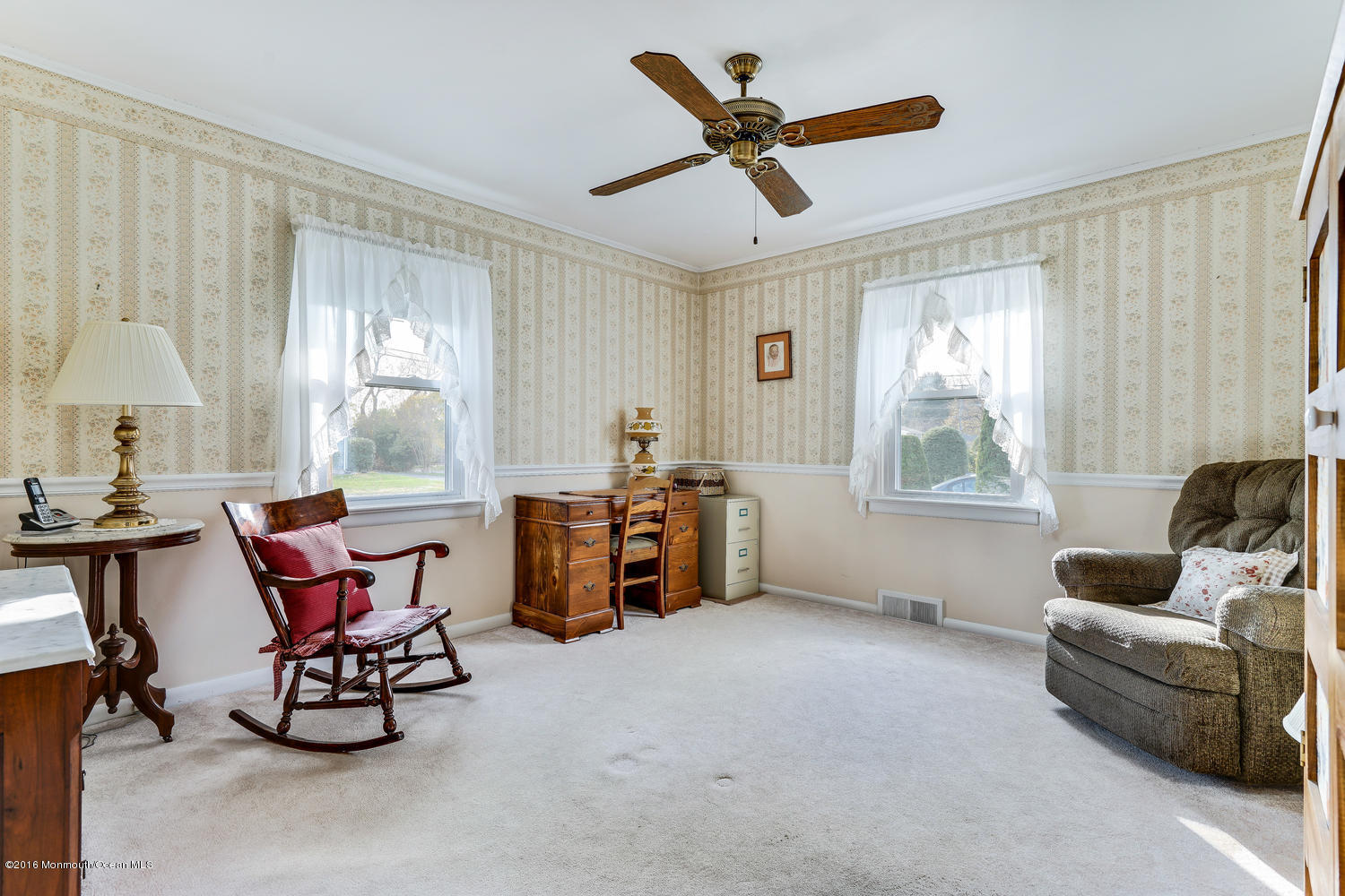 63 Cannon Road Freehold, NJ 07728 - Photo 23 of 34 a living room with furniture and a large window