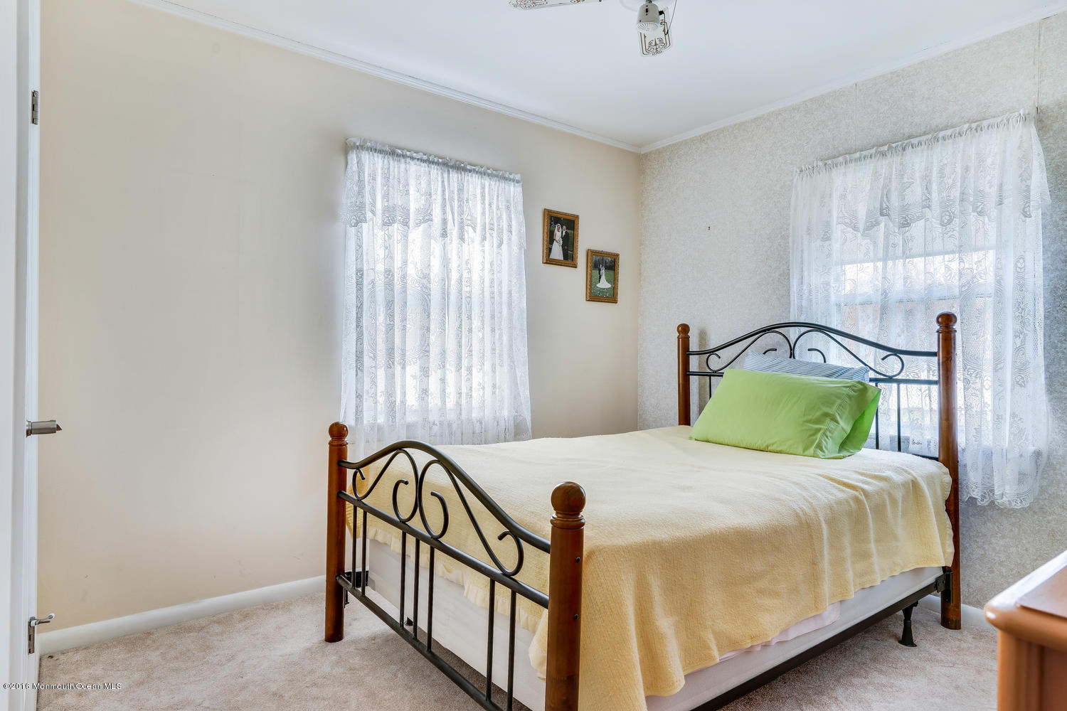 63 Cannon Road Freehold, NJ 07728 - Photo 25 of 34 a bedroom with a bed and window