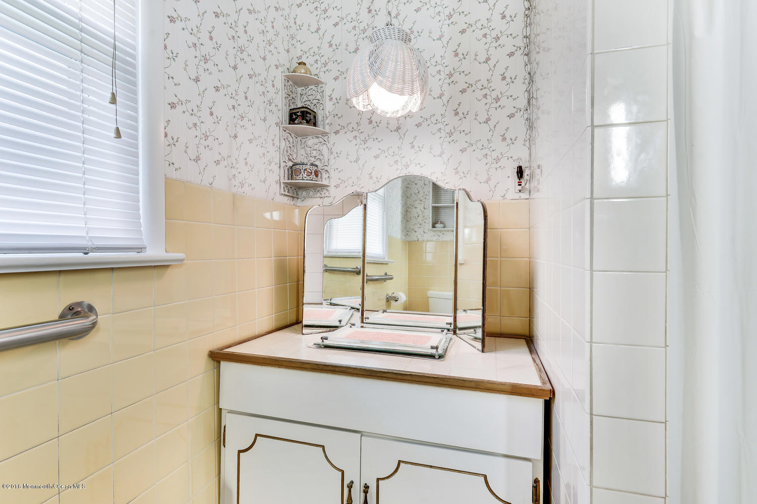 63 Cannon Road Freehold, NJ 07728 - Photo 28 of 34 a bathroom with a sink and a mirror
