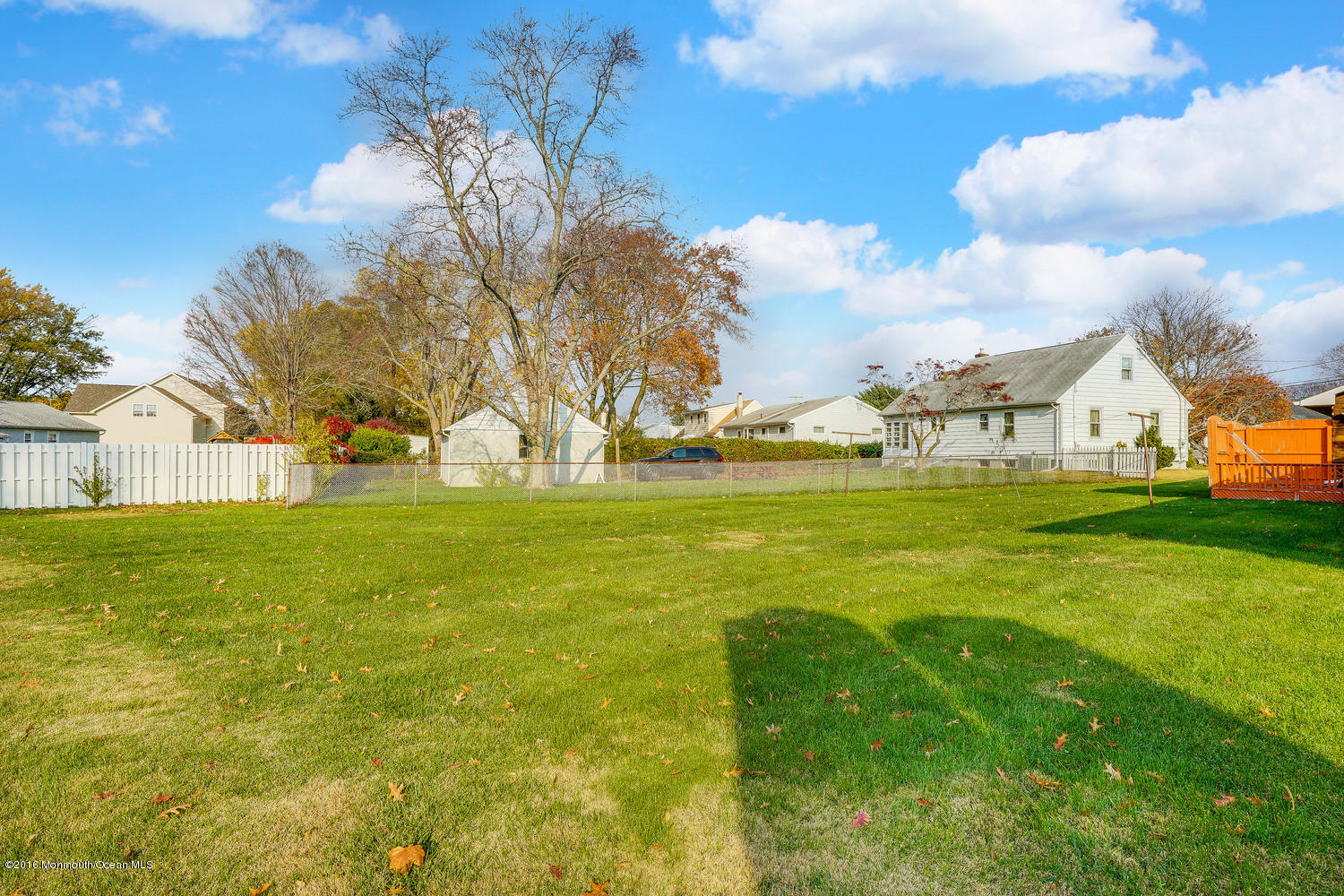 63 Cannon Road Freehold, NJ 07728 - Photo 34 of 34 a view of yard with swimming pool and green space