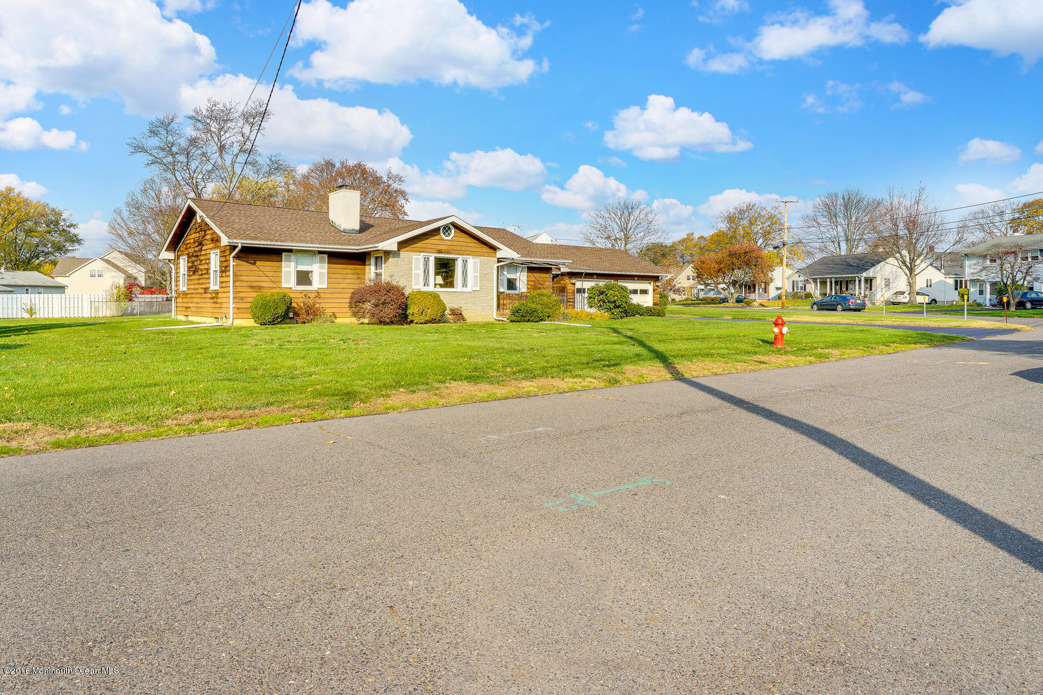 63 Cannon Road Freehold, NJ 07728 - Photo 4 of 34 a view of a house with a big yard and large trees