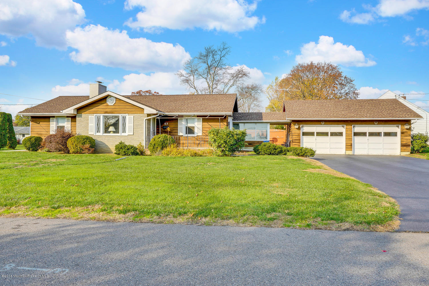 63 Cannon Road Freehold, NJ 07728 - Photo 5 of 34 a front view of a house with garden