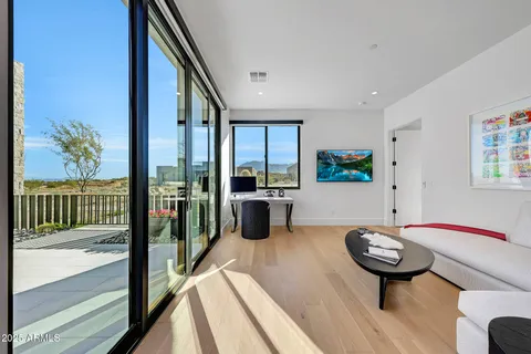a bedroom with bed and window