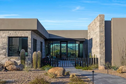 a front view of a building with glass windows