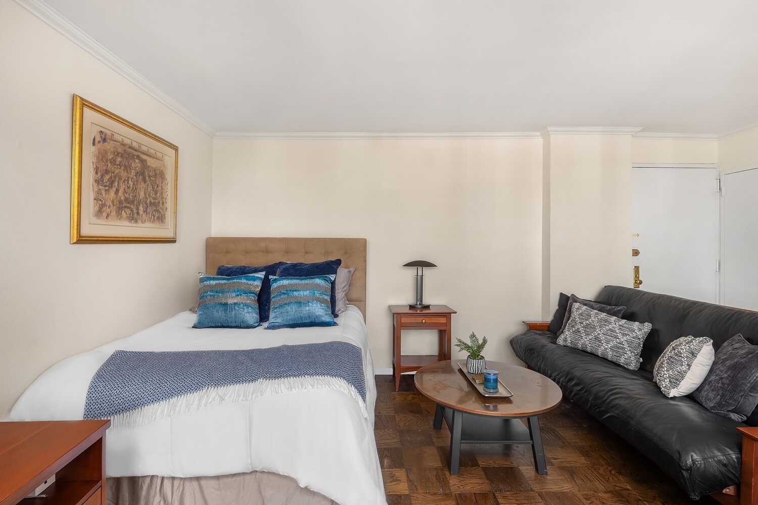 200 West 79th Street, Unit 16S Manhattan, NY 10024 - Photo 2 of 9 a bedroom with a bed couch and window