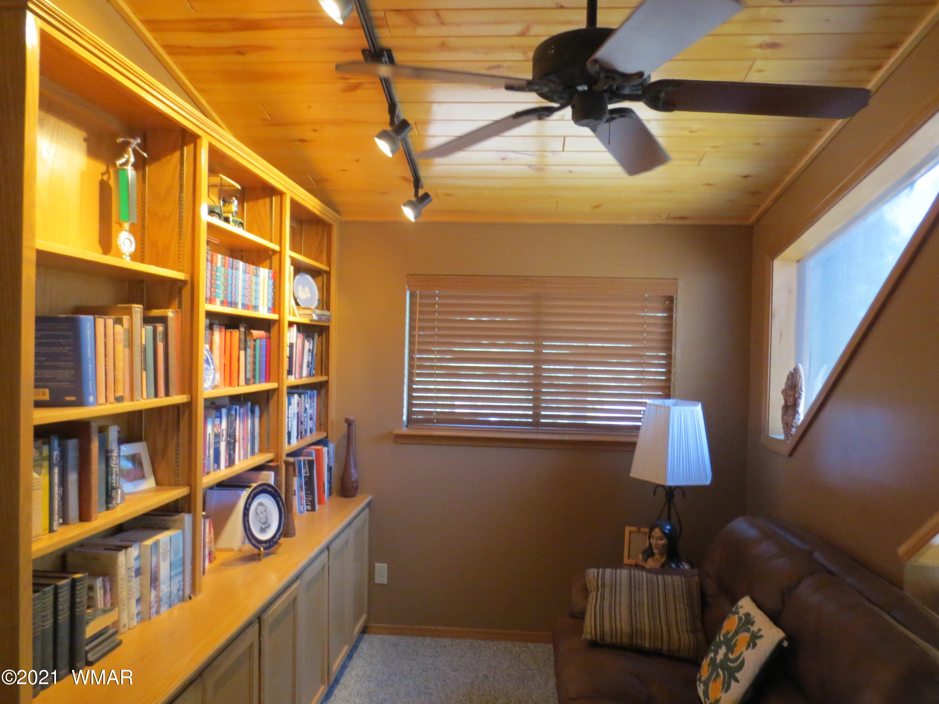 2970 Monica Road Overgaard, AZ 85933 - Photo 15 of 37 a view of a livingroom with furniture and staircase