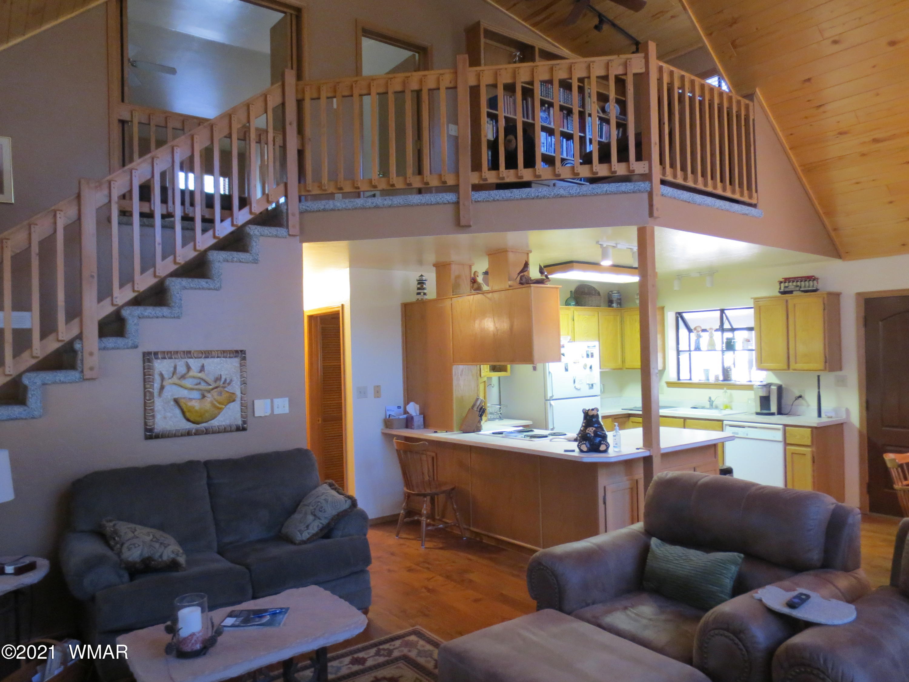 2970 Monica Road Overgaard, AZ 85933 - Photo 20 of 37 a living room with furniture and a ceiling fan