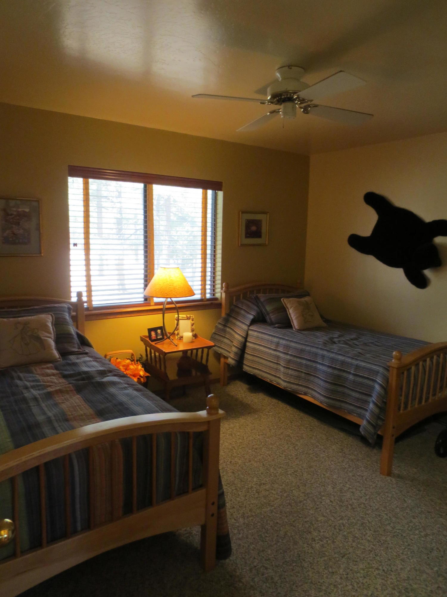 2970 Monica Road Overgaard, AZ 85933 - Photo 28 of 37 a bedroom with furniture and window