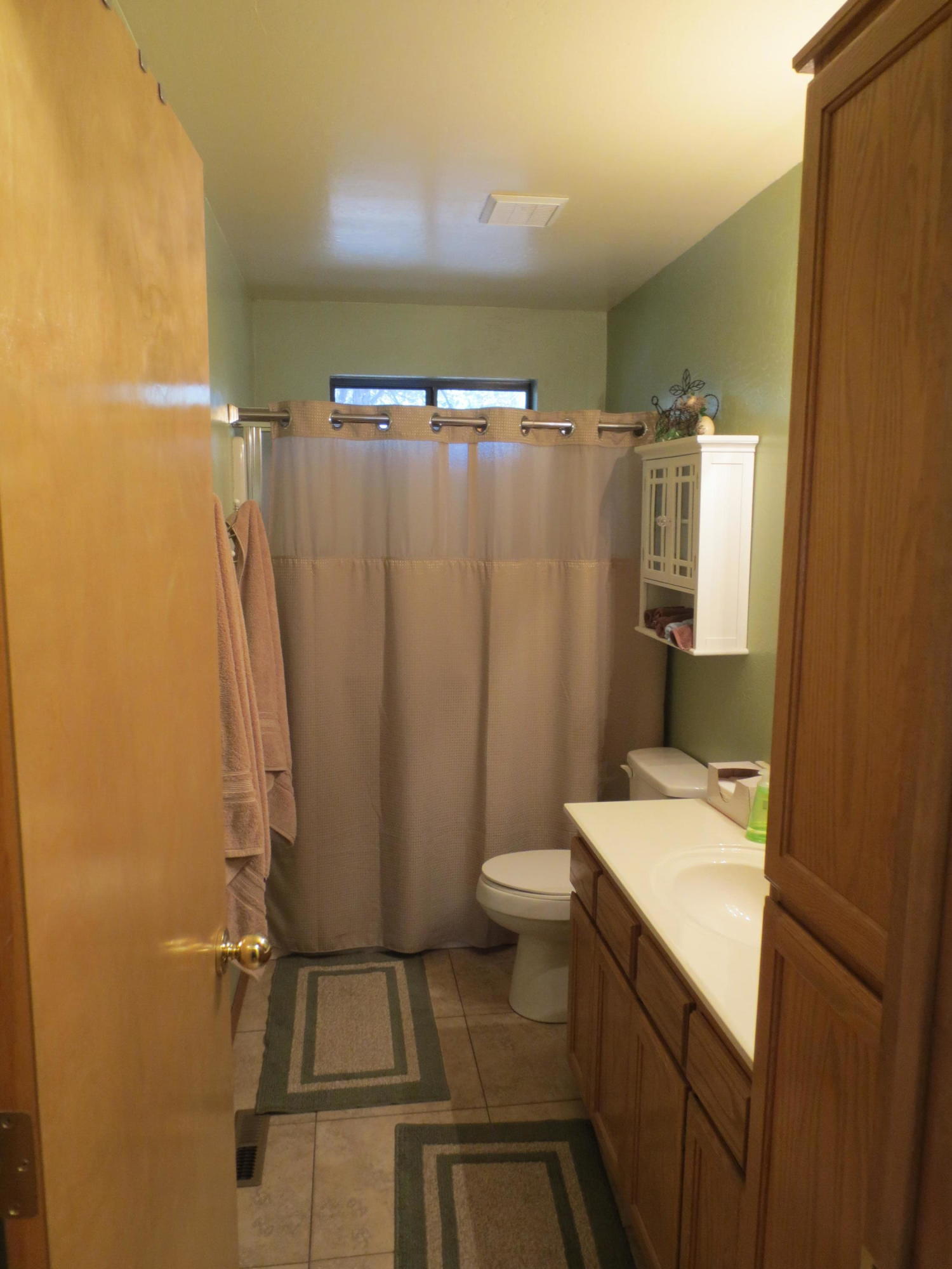 2970 Monica Road Overgaard, AZ 85933 - Photo 31 of 37 a bathroom with a sink a toilet and shower