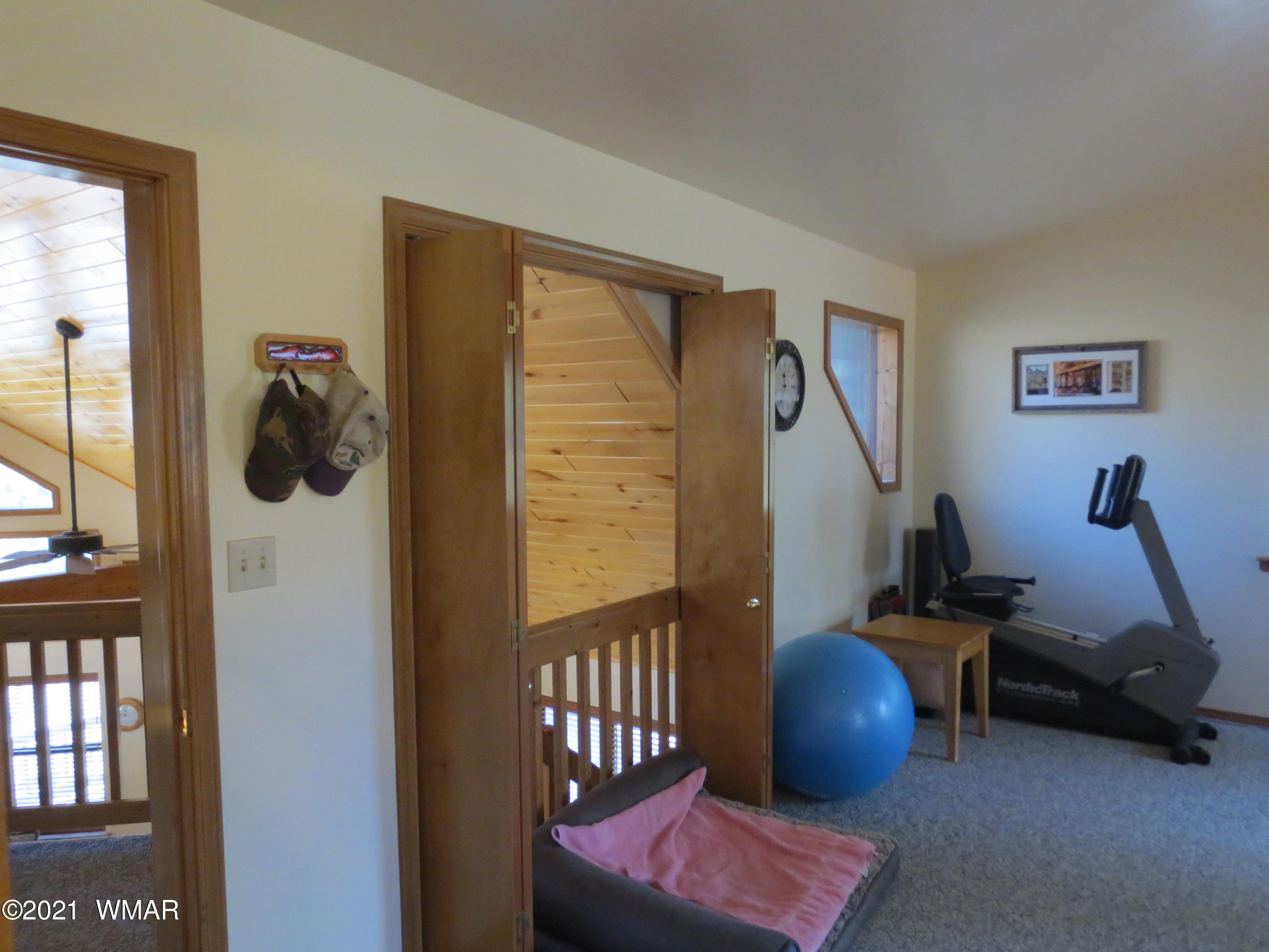 2970 Monica Road Overgaard, AZ 85933 - Photo 34 of 37 a view of a workspace with furniture and a window