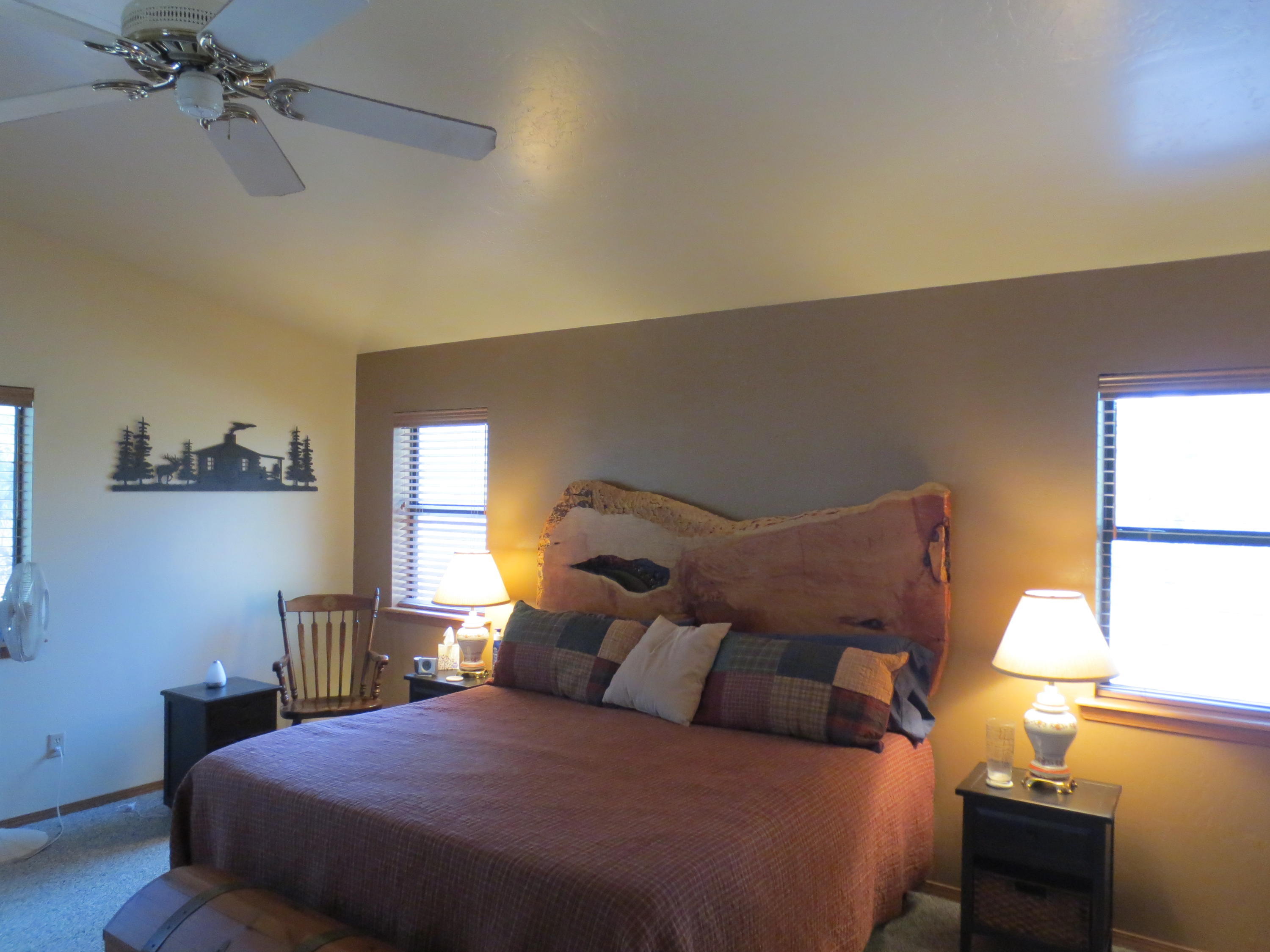 2970 Monica Road Overgaard, AZ 85933 - Photo 35 of 37 a bedroom with a bed and window