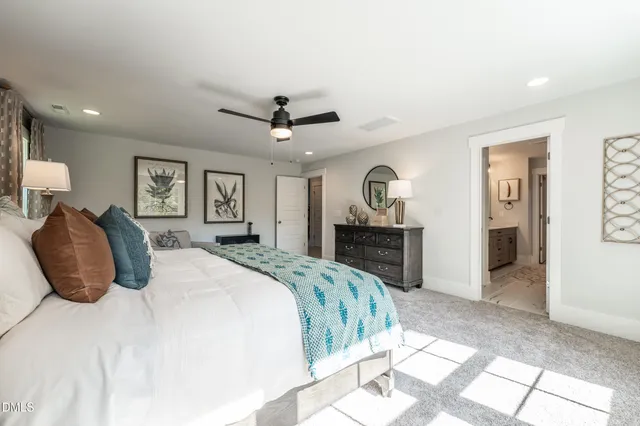a bathroom with a double vanity sink mirror and double