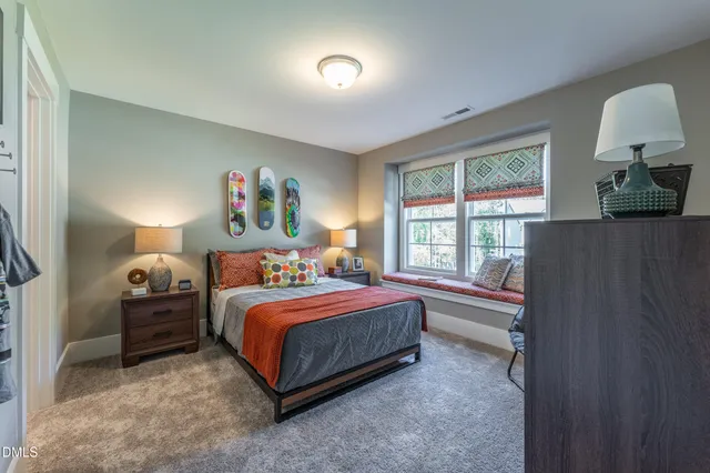 a bathroom with a toilet a sink and shower