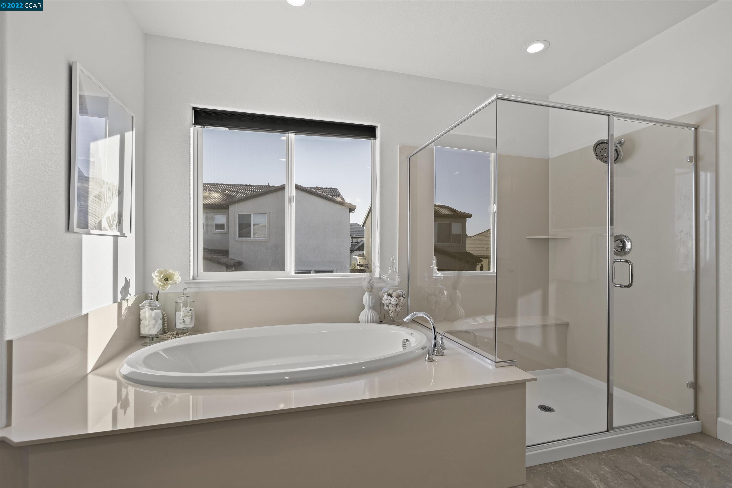 2468 Flag Stop Way Tracy, CA 95377 - Photo 15 of 36 a bathroom with a sink and a shower