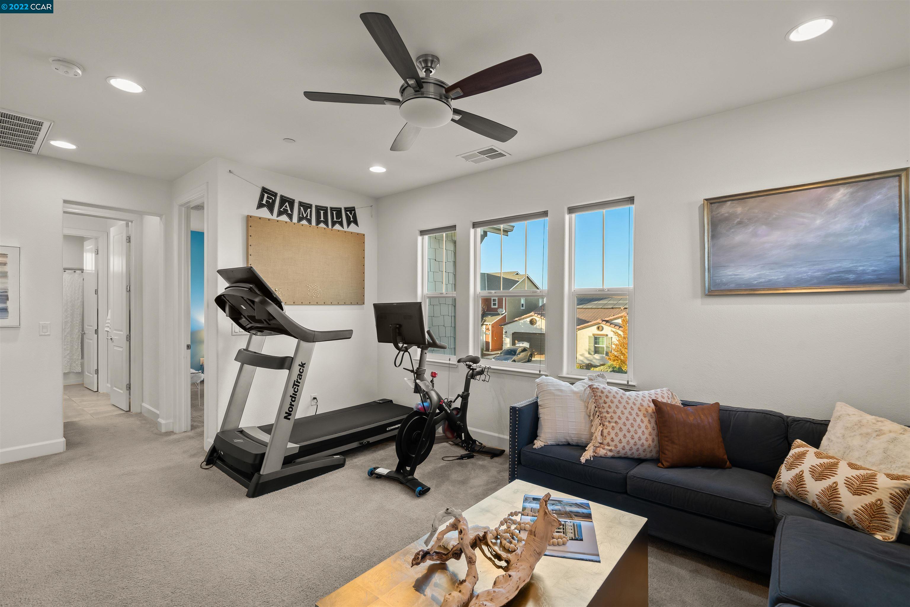 2468 Flag Stop Way Tracy, CA 95377 - Photo 17 of 36 a living room with furniture and a window