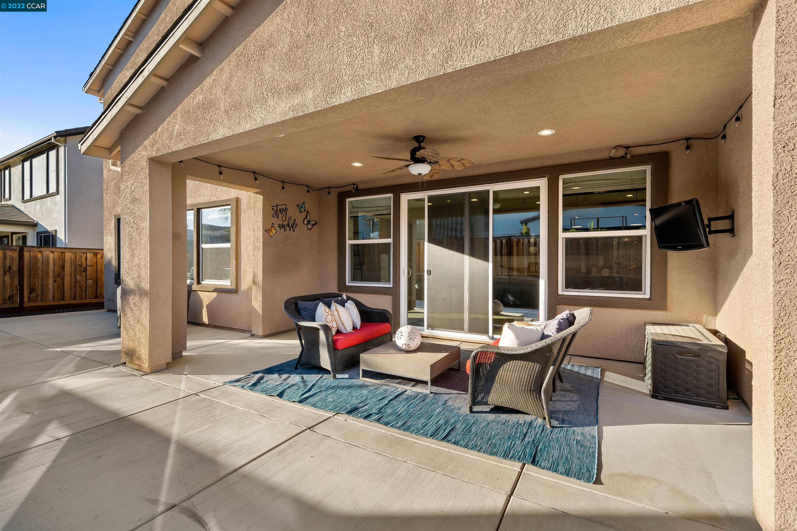 2468 Flag Stop Way Tracy, CA 95377 - Photo 25 of 36 a outdoor space with patio the couch and a window