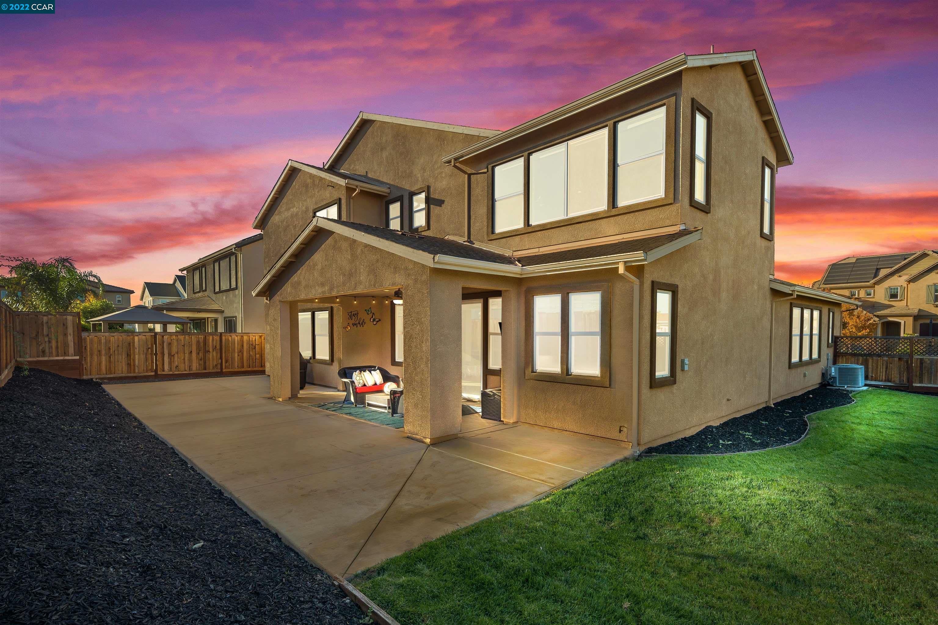 2468 Flag Stop Way Tracy, CA 95377 - Photo 28 of 36 a front view of a house with a yard