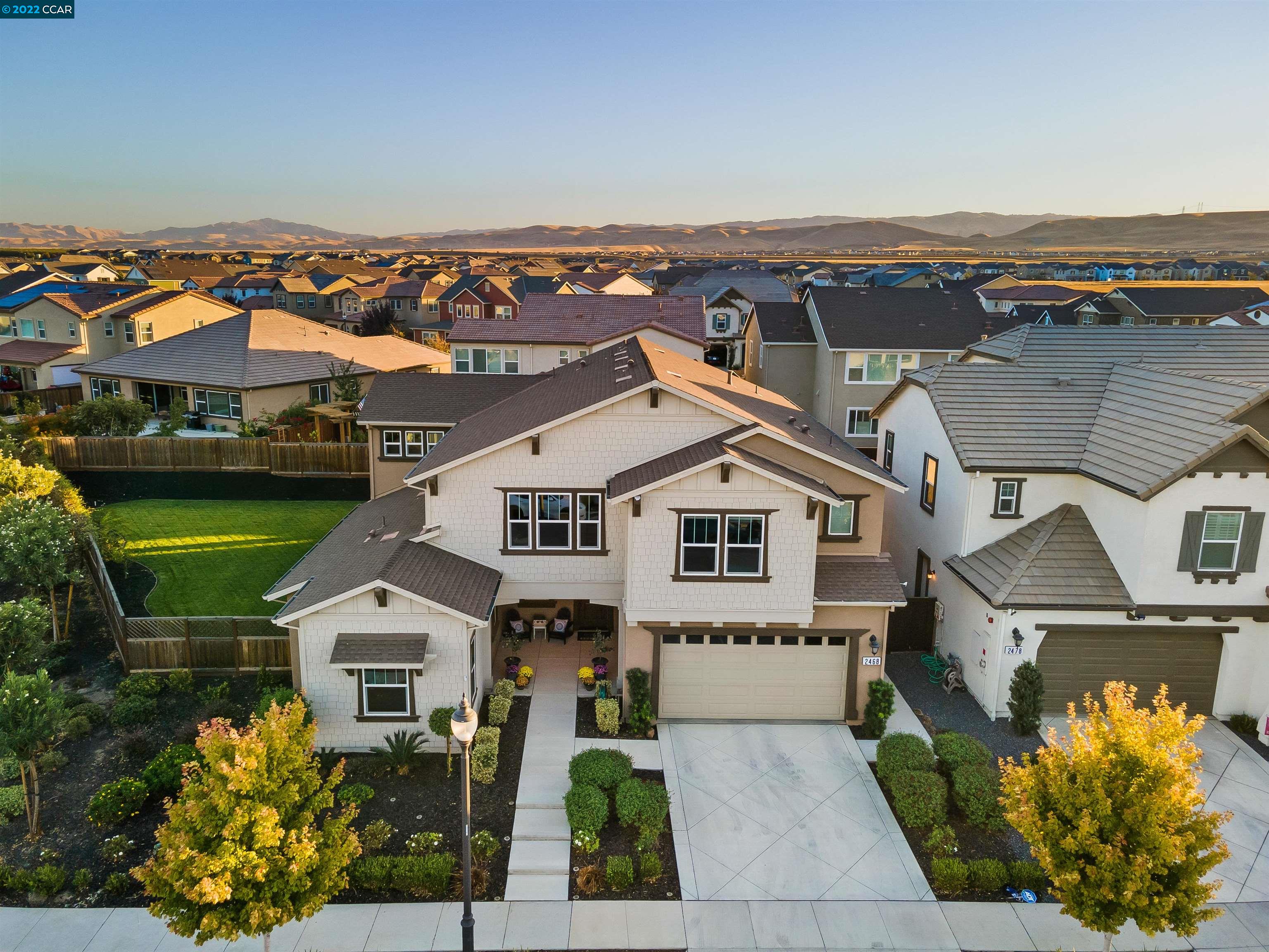 2468 Flag Stop Way Tracy, CA 95377 - Photo 29 of 36 an aerial view of a house with a yard