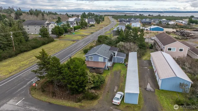 an aerial view of residential houses with outdoor space