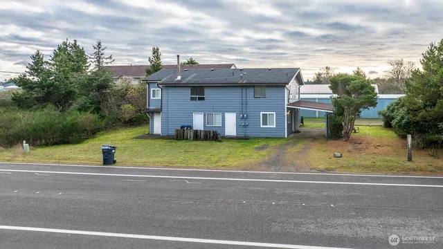 a view of a house with a street