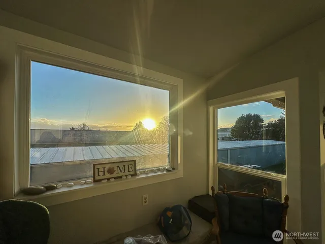 a room with furniture and a window