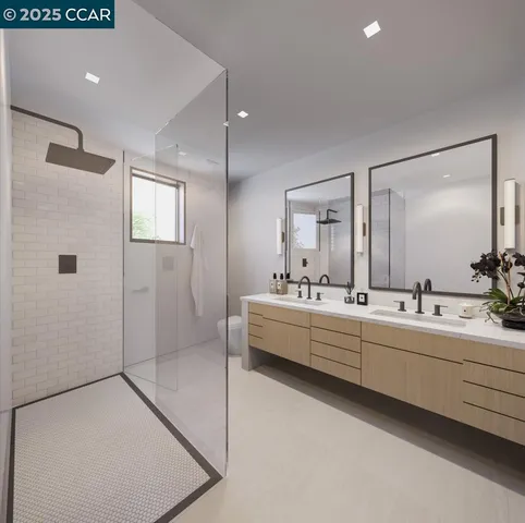 a large bathroom with a double vanity sink mirror and shower