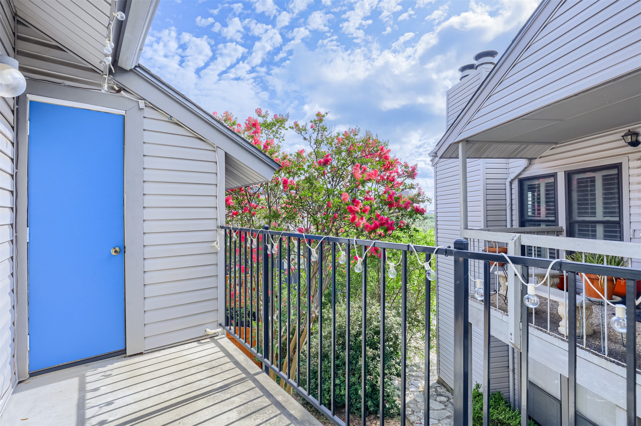 802 South 1st Street, Unit 206 Austin, TX 78704 - Photo 13 of 18 a view of a balcony with flower plants