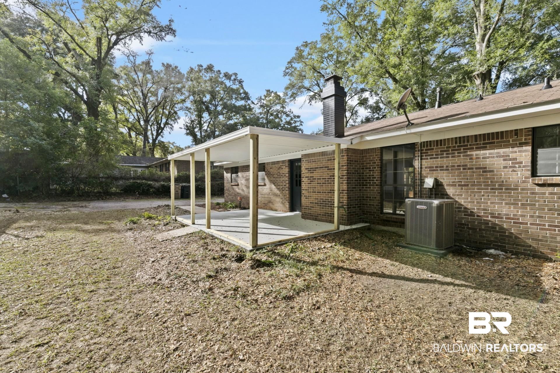 3270 Graham Road North Mobile, AL 36618 - Photo 39 of 54 View of yard with a patio and cooling unit