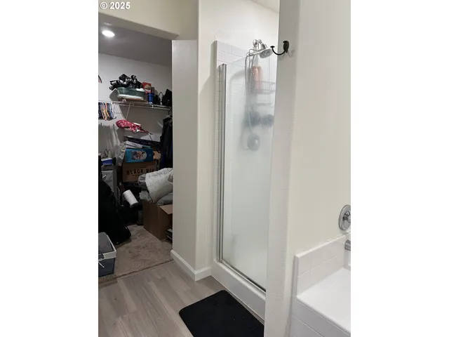 a view of a bedroom from a hallway