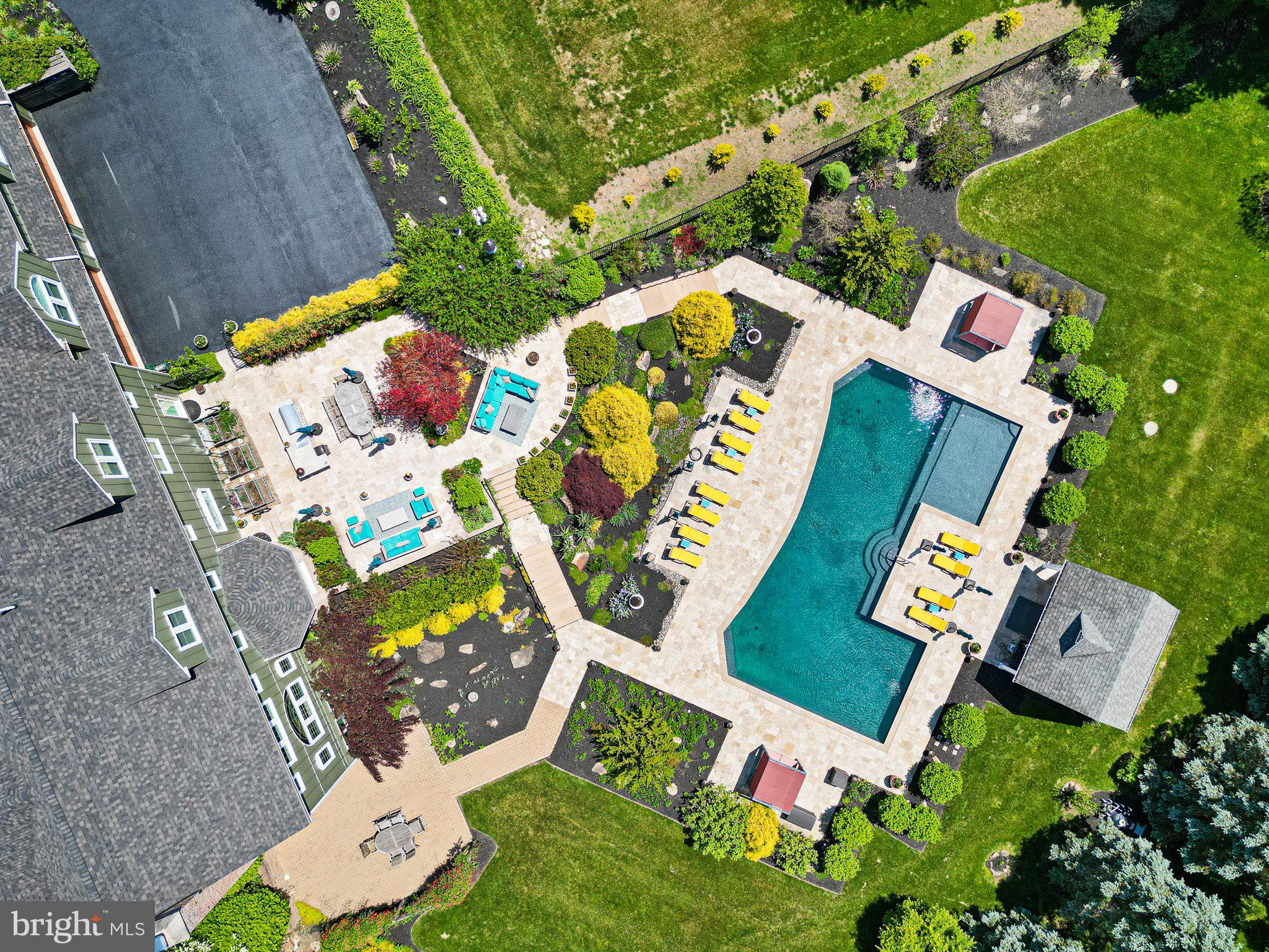 104 Indian Springs Road Kennett Square, PA 19348 - Photo 11 of 106 an aerial view of a house a yard and outdoor seating
