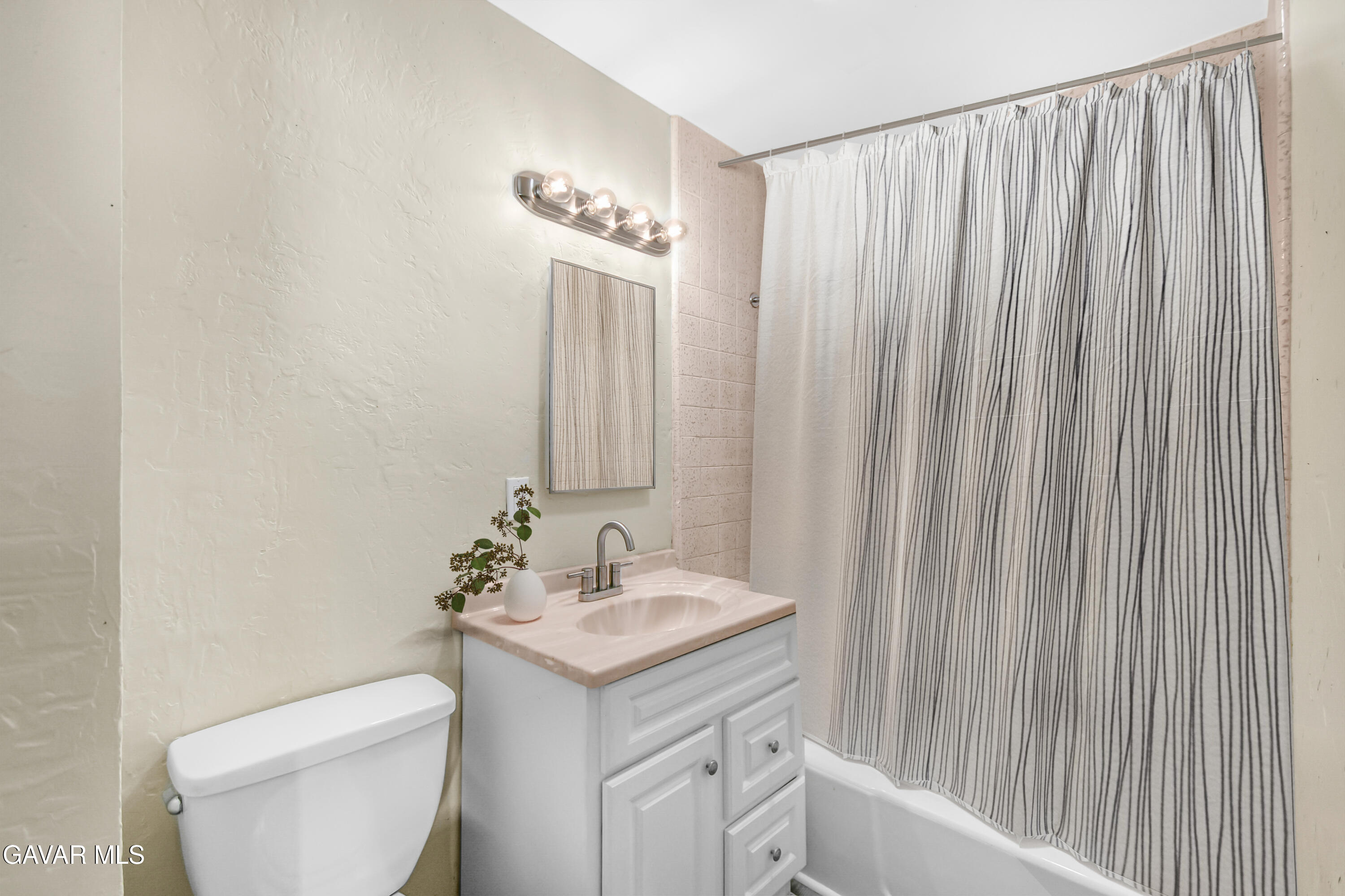 35339 Anthony Road Agua Dulce, CA 91390 - Photo 12 of 20 a bathroom with a toilet a sink and a mirror