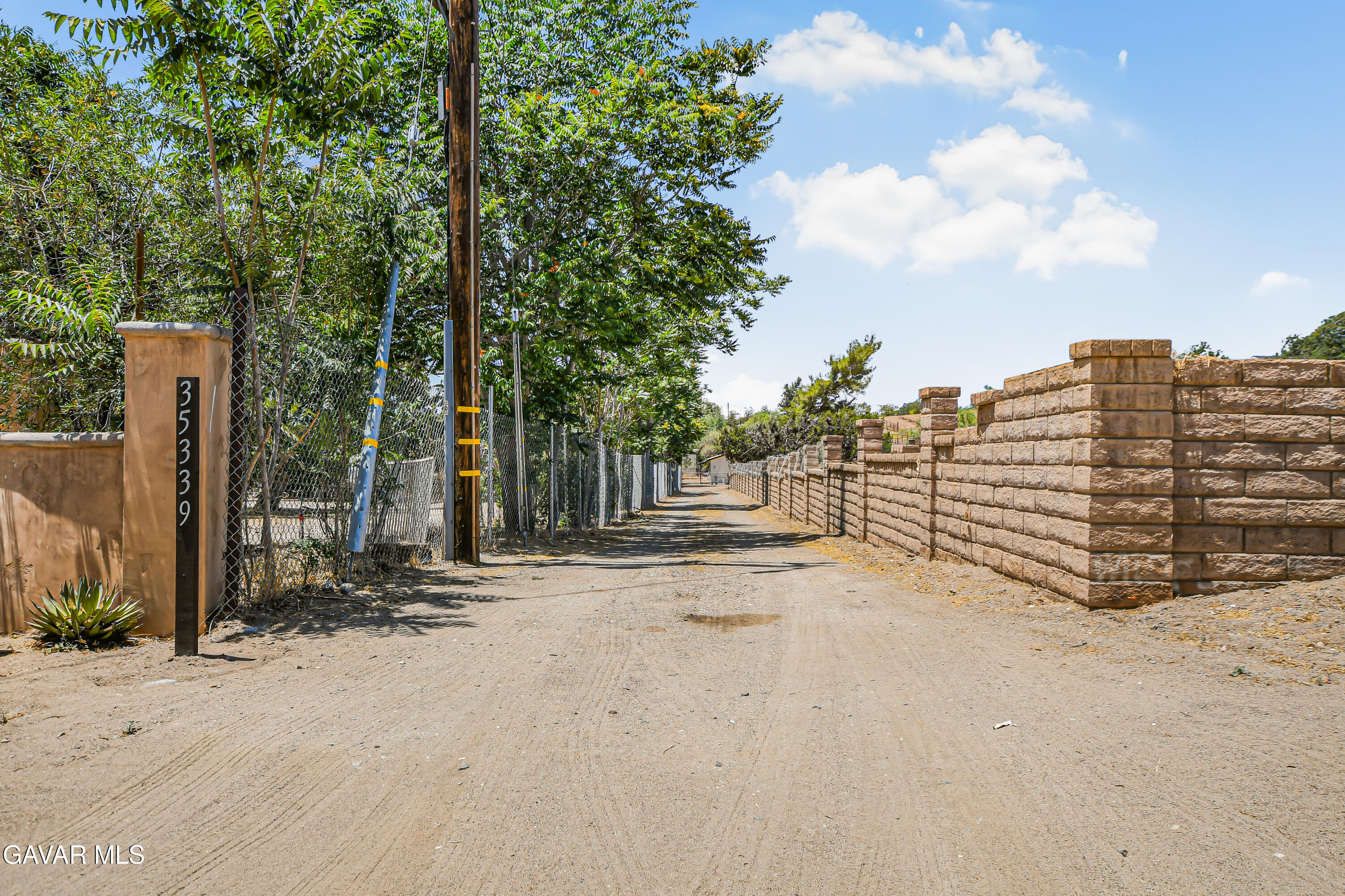 35339 Anthony Road Agua Dulce, CA 91390 - Photo 20 of 20 a view of a road with wooden fence