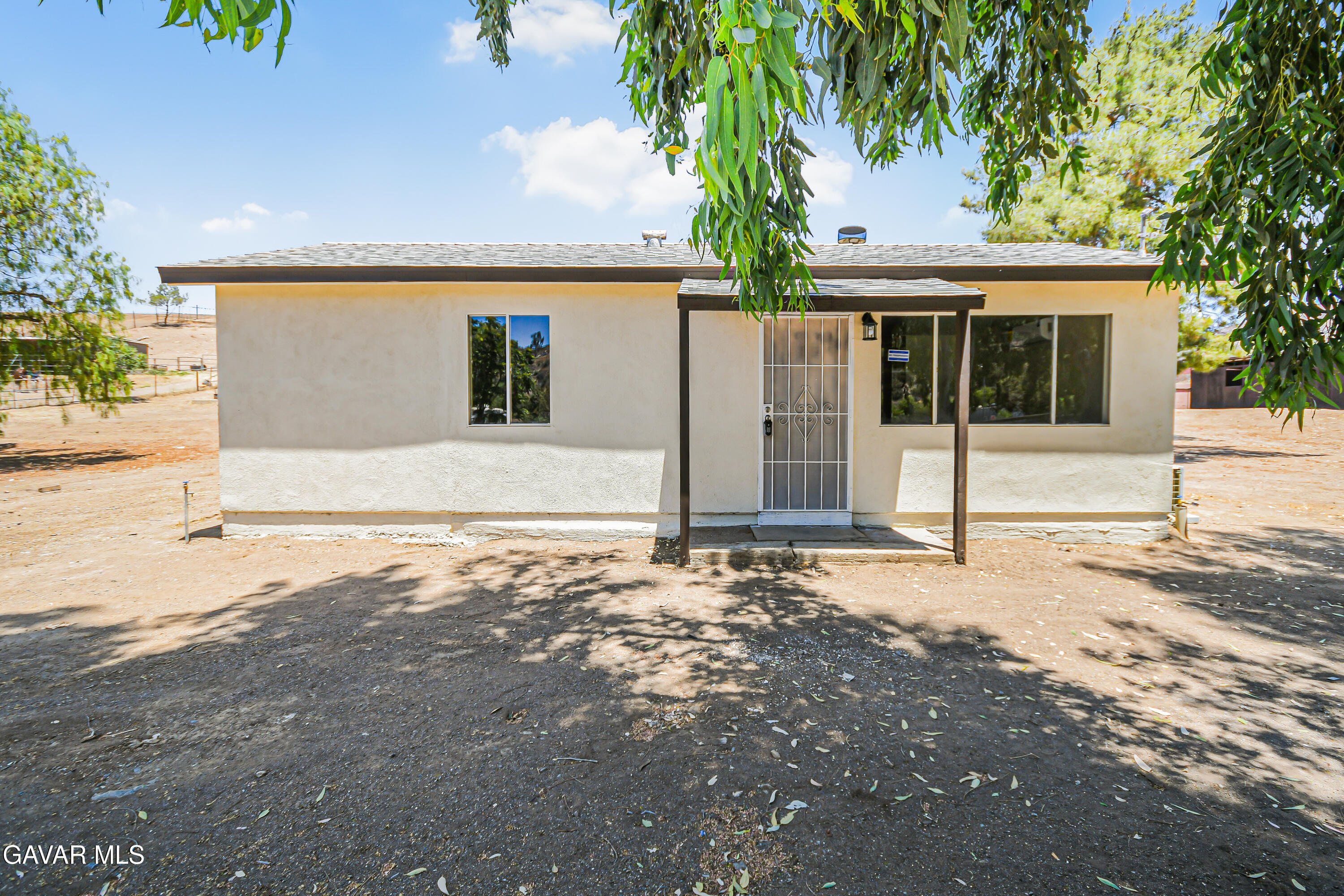 35339 Anthony Road Agua Dulce, CA 91390 - Photo 2 of 20 a view of a house with a tree