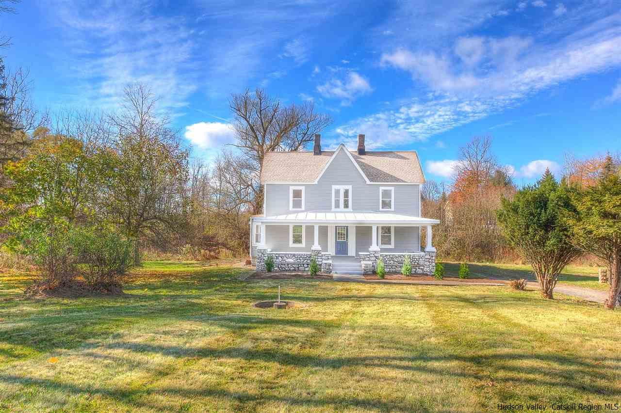 455 Plattekill Ardonia Road Wallkill, NY 12589 - Photo 1 of 24 a front view of a house with a large trees