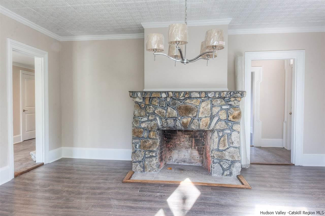 455 Plattekill Ardonia Road Wallkill, NY 12589 - Photo 13 of 24 a view of a room with wooden floor chandelier and wooden floor