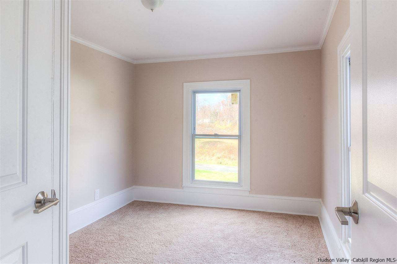 455 Plattekill Ardonia Road Wallkill, NY 12589 - Photo 24 of 24 an empty room with a window