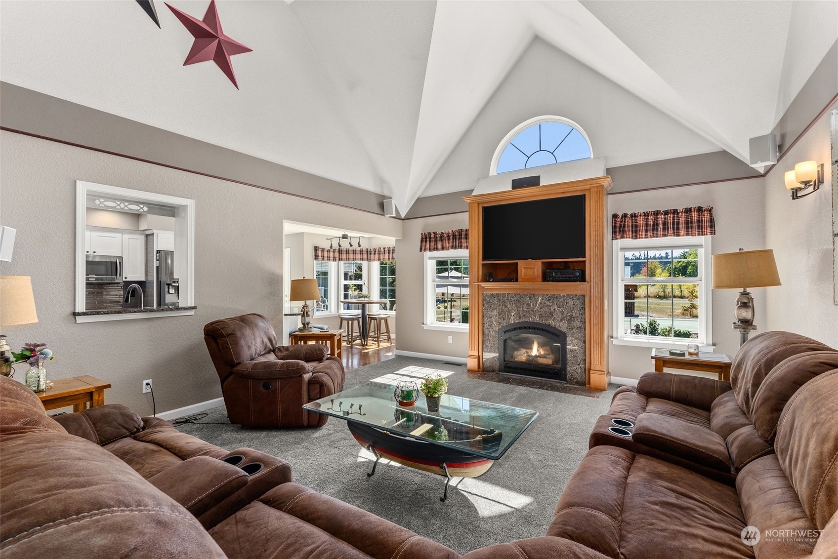 10909 188th Avenue Southwest Rochester, WA 98579 - Photo 11 of 40 a living room with furniture and a fireplace