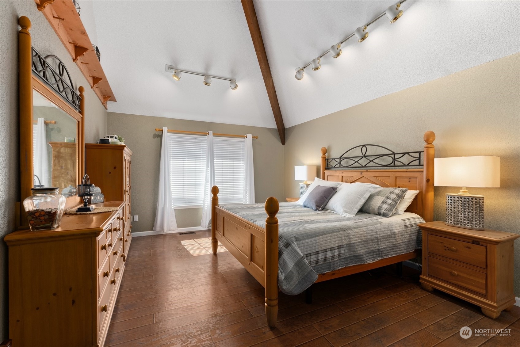 10909 188th Avenue Southwest Rochester, WA 98579 - Photo 19 of 40 a bedroom with a bed and wooden floor