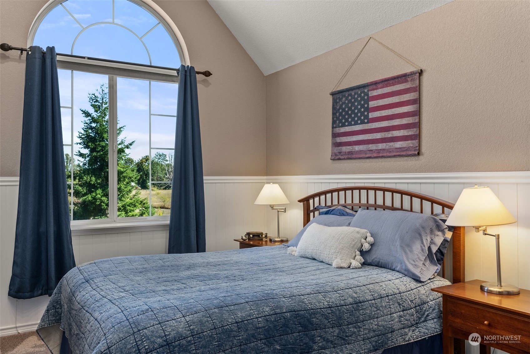 10909 188th Avenue Southwest Rochester, WA 98579 - Photo 26 of 40 a bedroom with a large bed and a window