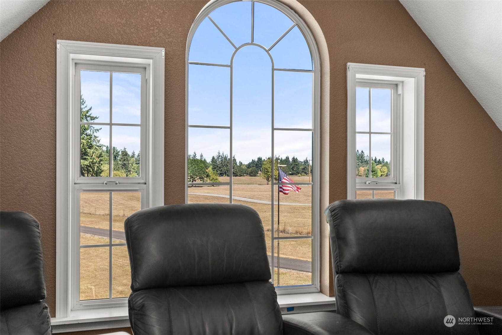 10909 188th Avenue Southwest Rochester, WA 98579 - Photo 31 of 40 a living room with furniture and a window