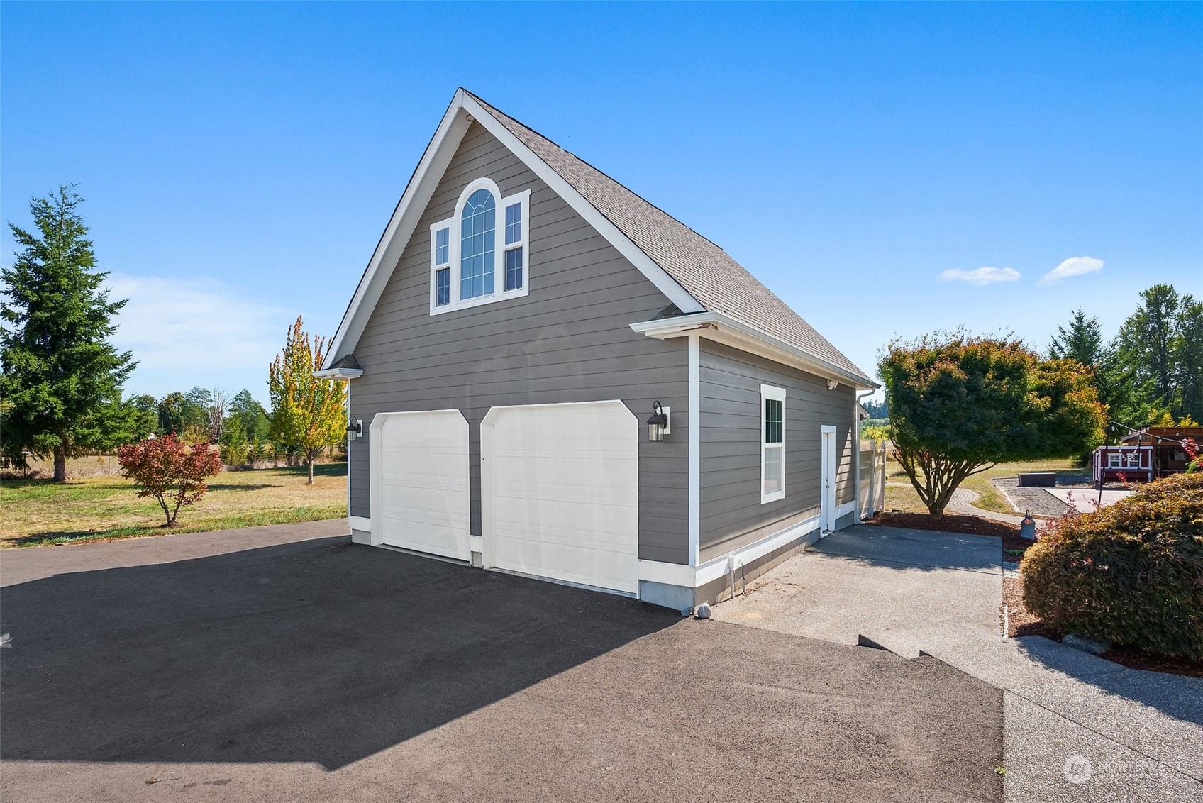 10909 188th Avenue Southwest Rochester, WA 98579 - Photo 35 of 40 a view of a house with a outdoor space and street view