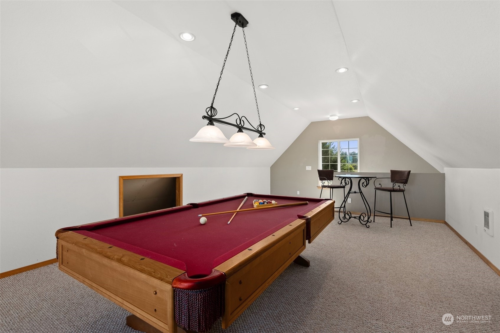 10909 188th Avenue Southwest Rochester, WA 98579 - Photo 36 of 40 a living room with a table chairs and ceiling fan