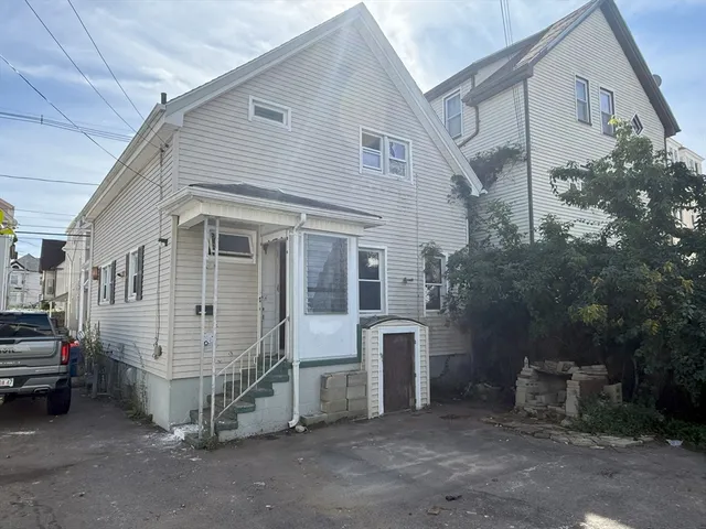 a view of a house with a garage
