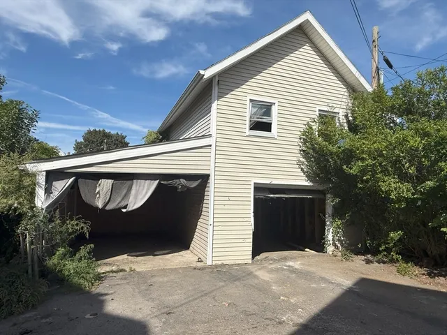 a front view of a house with a garage