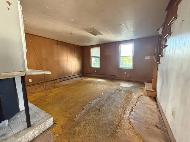 a view of a livingroom with a staircase